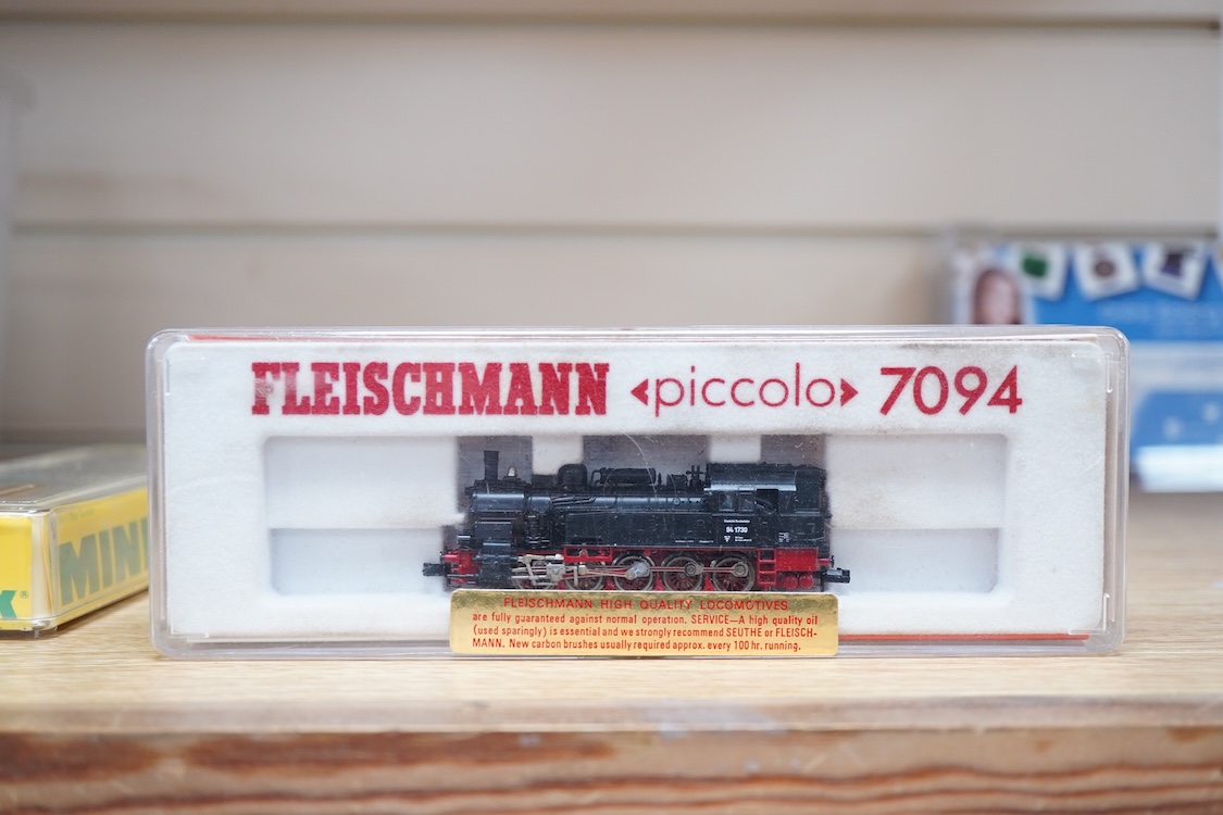 Twenty-eight boxed N gauge railway by Graham Farish, Minitrix, Fleischmann, etc. including four locomotives; an LNER class A3, Flying Scotsman (12950), a BR 0-6-0T, 47160 (N.201), a German DB 0-10-0T, 94 1730, (7094), an